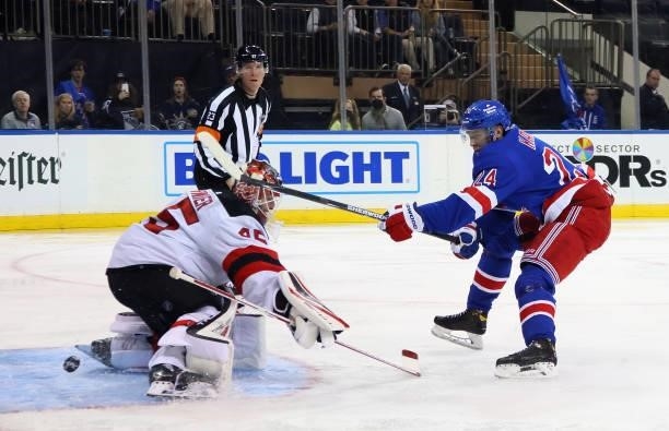 Kaapo Kakko of the New York Rangers scores a second period goal against Jonathan Bernier of the New Jersey Devils during a preseason game at Madison...