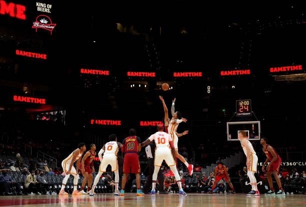 The Atlanta Hawks tip off against the Cleveland Cavaliers at State Farm Arena on October 06, 2021 in Atlanta, Georgia. NOTE TO USER: User expressly...