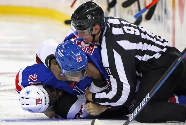 Chris Kreider of the New York Rangers and P.K. Subban of the New Jersey Devils fight during the third period during a preseason game at Madison...