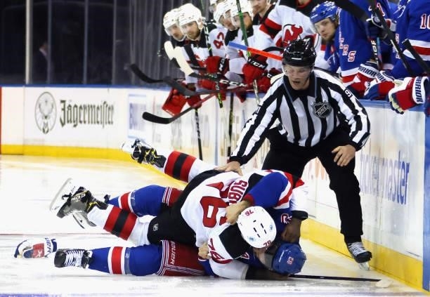 Chris Kreider of the New York Rangers and P.K. Subban of the New Jersey Devils fight during the third period during a preseason game at Madison...