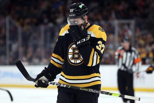 Patrice Bergeron of the Boston Bruins reacts during the third period of the preseason game against the Washington Capitals at TD Garden on October...