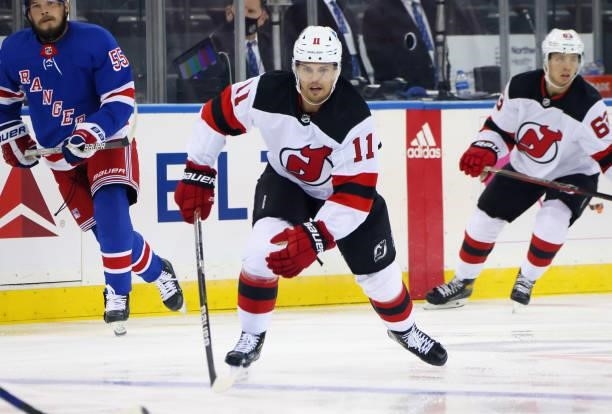 Andreas Johnsson of the New Jersey Devils skates against the New York Rangers during a preseason game at Madison Square Garden on October 06, 2021 in...