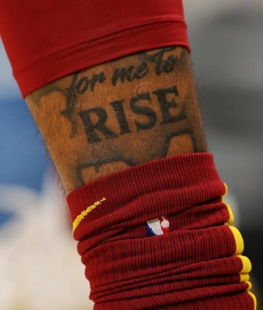 Tattoo on the leg of Lamar Stevens of the Cleveland Cavaliers is seen against the Atlanta Hawks during the first half at State Farm Arena on October...