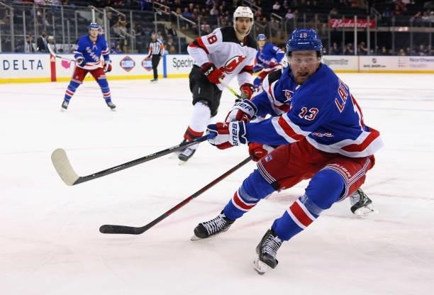 Alexis Lafreniere of the New York Rangers skates against the New Jersey Devils during a preseason game at Madison Square Garden on October 06, 2021...