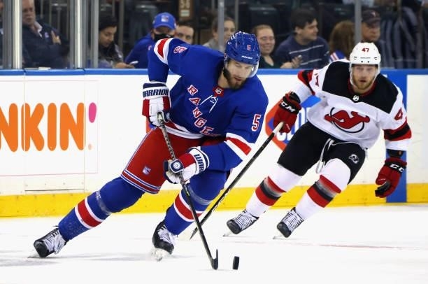 Jarred Tinordi of the New York Rangers skates against the New Jersey Devils during a preseason game at Madison Square Garden on October 06, 2021 in...