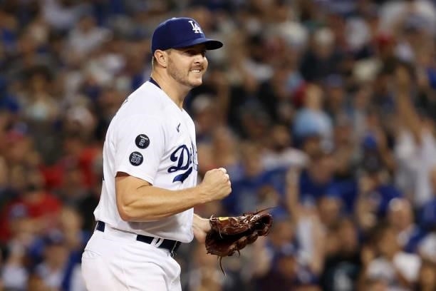 Corey Knebel of the Los Angeles Dodgers reacts after striking out Harrison Bader of the St. Louis Cardinals in the eighth inning during the National...