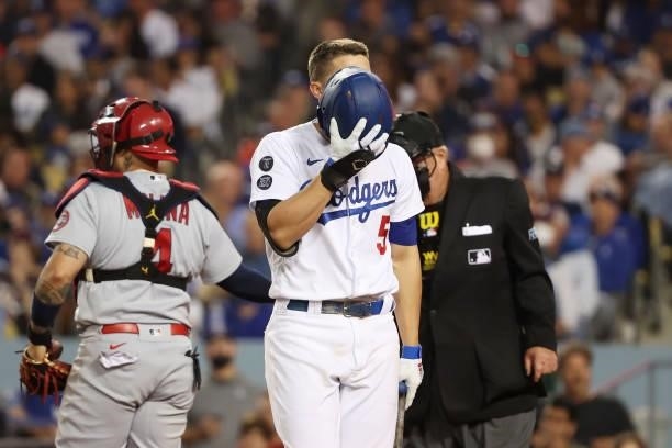 Corey Seager of the Los Angeles Dodgers reacts after striking out in the eighth inning against the St. Louis Cardinals during the National League...