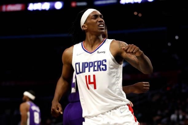 Terance Mann of the Los Angeles Clippers reacts after a shot against the Sacramento Kings during the second quarter of the preseason game at Staples...
