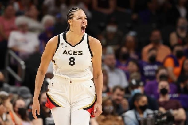 Liz Cambage of the Las Vegas Aces celebrates after a three-point shot against the Phoenix Mercury during the second half in Game Four of the 2021...