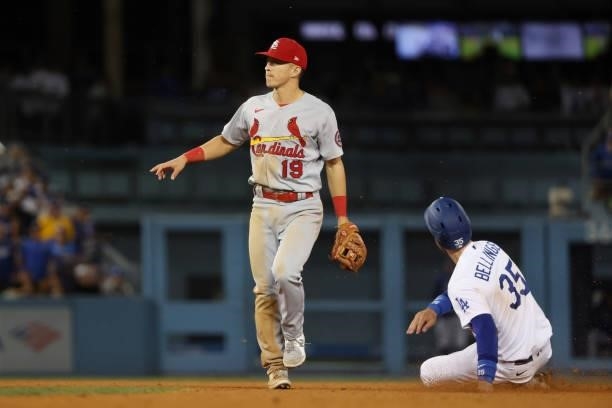 Cody Bellinger of the Los Angeles Dodgers steals second against Tommy Edman of the St. Louis Cardinals in the ninth inning during the National League...