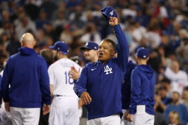 Dave Roberts of the Los Angeles Dodgers celebrates their 3 to 1 win over the St. Louis Cardinals in the National League Wild Card Game at Dodger...