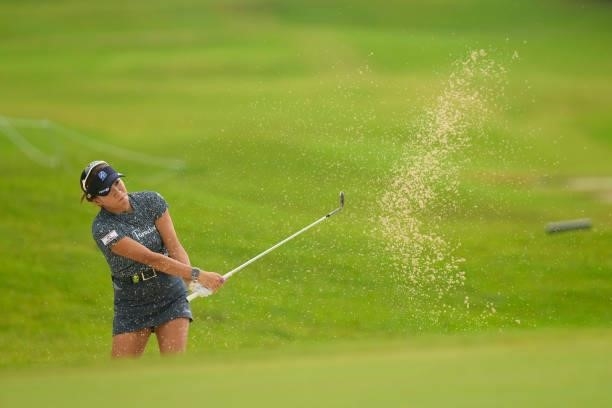 Eri Joma of Japan hits out from a bunker on the 1st hole during the first round of Kanehide Miyarabi Open at the Kanehide Kise Country Club on...