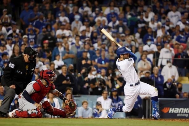Chris Taylor of the Los Angeles Dodgers hits a walk off two-run home run in the ninth inning to defeat the St. Louis Cardinals 3 to 1 during the...