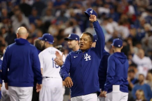Dave Roberts of the Los Angeles Dodgers celebrates their 3 to 1 win over the St. Louis Cardinals in the National League Wild Card Game at Dodger...