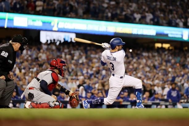 Chris Taylor of the Los Angeles Dodgers hits a walk off two-run home run in the ninth inning to defeat the St. Louis Cardinals 3 to 1 during the...