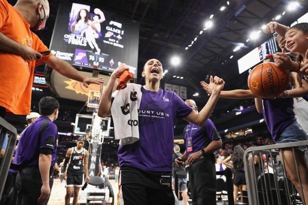 Diana Taurasi of the Phoenix Mercury high fives fans following Game Four of the 2021 WNBA semifinals against the Las Vegas Aces at Footprint Center...