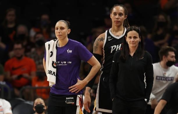 Diana Taurasi, Brittney Griner and head coach Sandy Brondello, of the Phoenix Mercury react during the final seconds in Game Four of the 2021 WNBA...