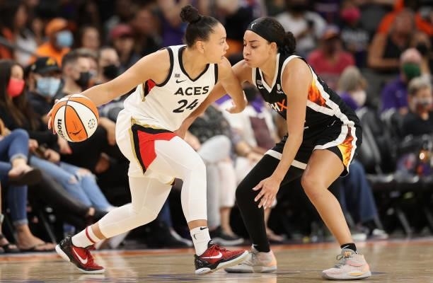 Destiny Slocum of the Las Vegas Aces looks to pass around Bria Hartley of the Phoenix Mercury during the second half in Game Four of the 2021 WNBA...