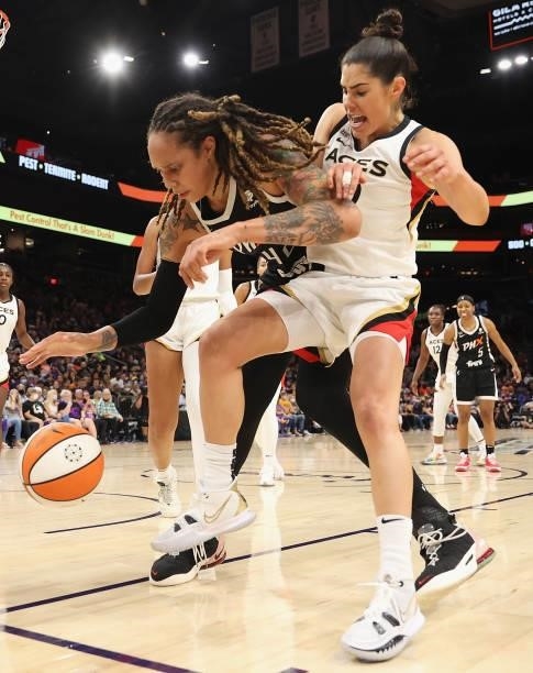 Brittney Griner of the Phoenix Mercury handles the ball under pressure from Kelsey Plum of the Las Vegas Aces during the second half in Game Four of...