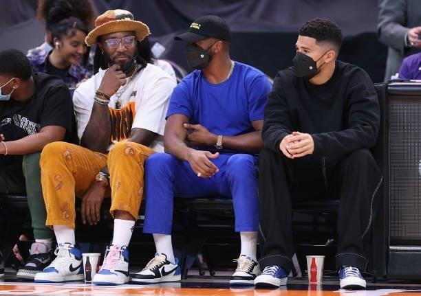 Phoenix Suns players, Jay Crowder, Chris Paul and Devin Booker attend Game Four of the 2021 WNBA semifinals between the Phoenix Mercury and the Las...