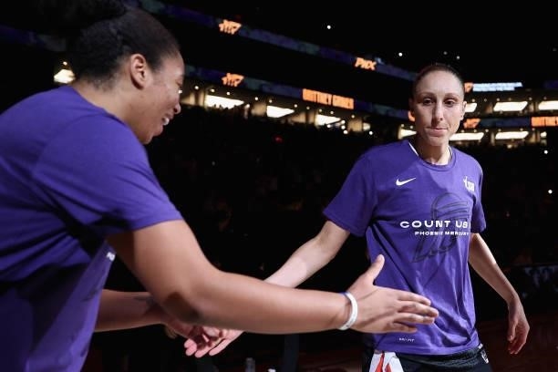 Diana Taurasi of the Phoenix Mercury high fives teammates as she is introduced to Game Four of the 2021 WNBA semifinals against the Las Vegas Aces at...