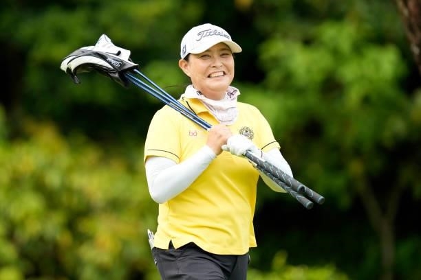 Yuko Saito of Japan smiles on the 4th hole during the first round of Kanehide Miyarabi Open at the Kanehide Kise Country Club on October 7, 2021 in...