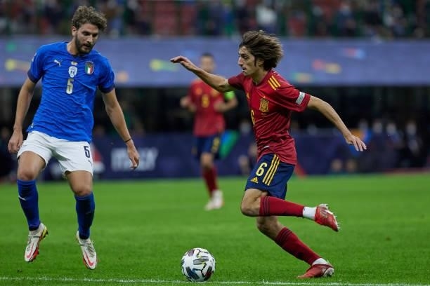 Bryan Gil of Spain competes for the ball with Manuel Locatelli of Italy during the UEFA Nations League 2021 Semi-final match between Italy and Spain...