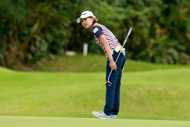 Karen Gondo of Japan reacts after a putt on the 9th green during the first round of Kanehide Miyarabi Open at the Kanehide Kise Country Club on...