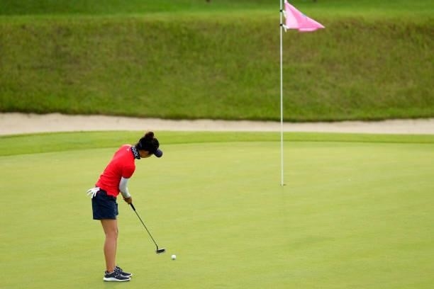 Mana Shinozaki of Japan attempts a putt on the 18th green during the first round of Kanehide Miyarabi Open at the Kanehide Kise Country Club on...