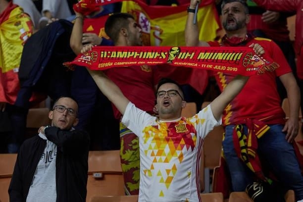 Fans of Spain enjoy the atmosphere during the UEFA Nations League 2021 Semi-final match between Italy and Spain at the Giuseppe Meazza Stadium on...