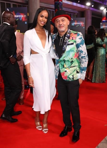 Sabrina Dhowre Elba and Christian Louboutin attend "The Harder They Fall