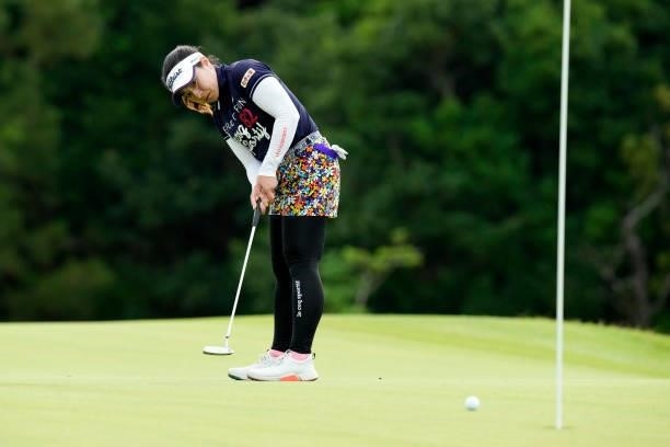 Mika Nakazono of Japan holes the birdie putt on the 9th green during the first round of Kanehide Miyarabi Open at the Kanehide Kise Country Club on...
