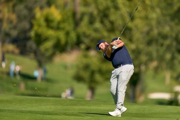 Andrew Johnston of England plays a shot during Day One of The Acciona Open de Espana at Club de Campo Villa de Madrid on October 07, 2021 in Madrid,...