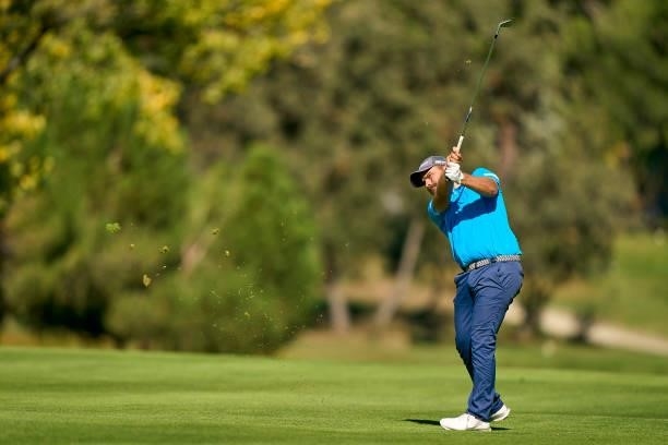 Romain Langasque of France plays a shot during Day One of The Acciona Open de Espana at Club de Campo Villa de Madrid on October 07, 2021 in Madrid,...