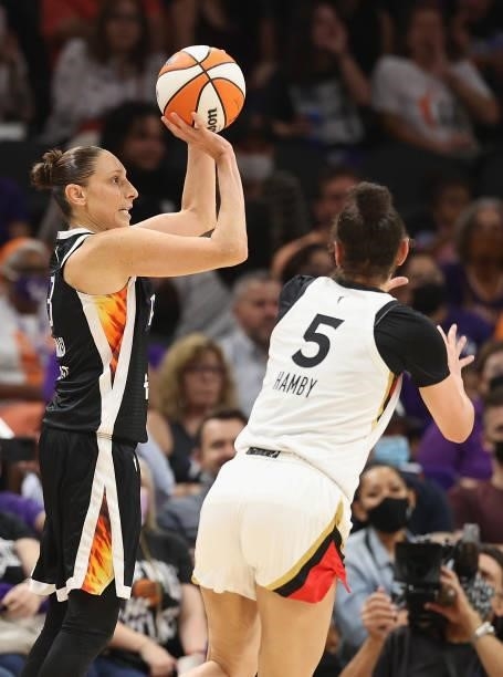 Diana Taurasi of the Phoenix Mercury puts up a three-point shot over Dearica Hamby of the Las Vegas Aces during the first half in Game Four of the...