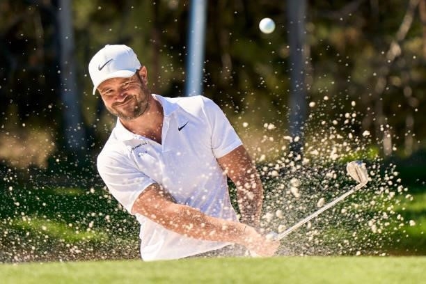Jean-Baptiste Gonnet of France plays a shot from a bunker during Day One of The Acciona Open de Espana at Club de Campo Villa de Madrid on October...