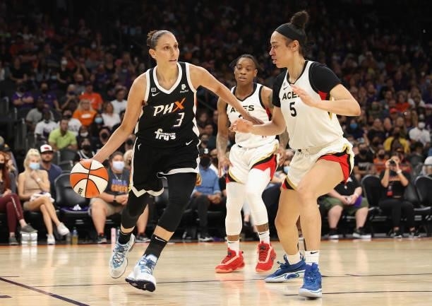 Diana Taurasi of the Phoenix Mercury handles the ball against Dearica Hamby of the Las Vegas Aces during the second half in Game Four of the 2021...