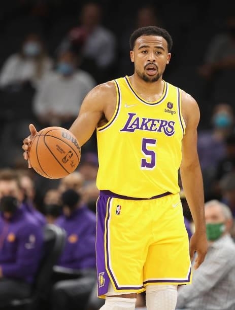Talen Horton-Tucker of the Los Angeles Lakers handles the ball during the NBA preseason game at Footprint Center on October 06, 2021 in Phoenix,...