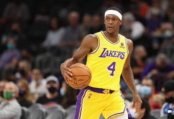 Rajon Rondo of the Los Angeles Lakers handles the ball during the NBA preseason game at Footprint Center on October 06, 2021 in Phoenix, Arizona. The...