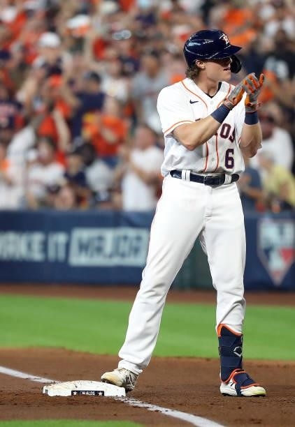 Jake Meyers of the Houston Astros reacts after hitting a single to drive in the Astros' first run during the 2nd inning of Game 1 of the American...