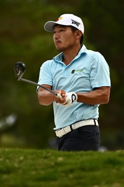 Sung Kang of South Korea hits his second shot on the ninth hole during round one of the Shriners Children's Open at TPC Summerlin on October 07, 2021...