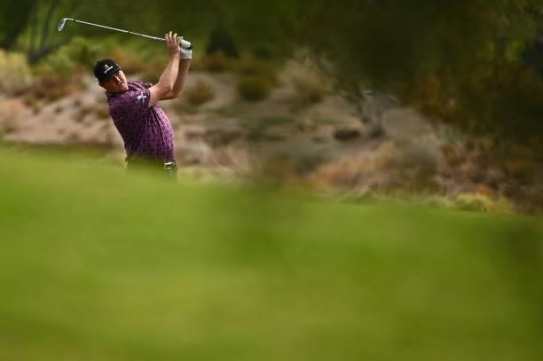 Jason Kokrak hits his second shot on the 18th hole during round one of the Shriners Children's Open at TPC Summerlin on October 07, 2021 in Las...