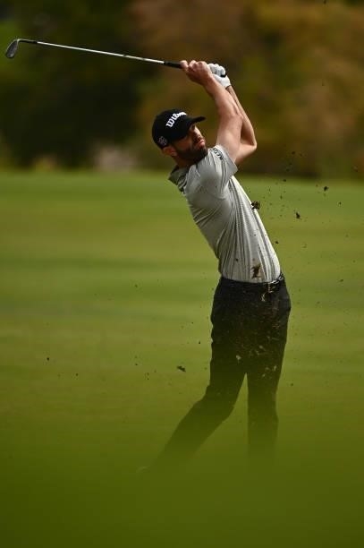 Kevin Tway hits his second shot on the 18th hole during round one of the Shriners Children's Open at TPC Summerlin on October 07, 2021 in Las Vegas,...