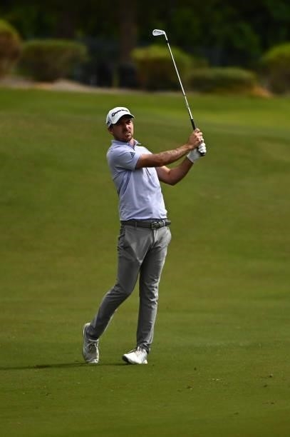 Nick Taylor hits his second shot on the 18th hole during round one of the Shriners Children's Open at TPC Summerlin on October 07, 2021 in Las Vegas,...