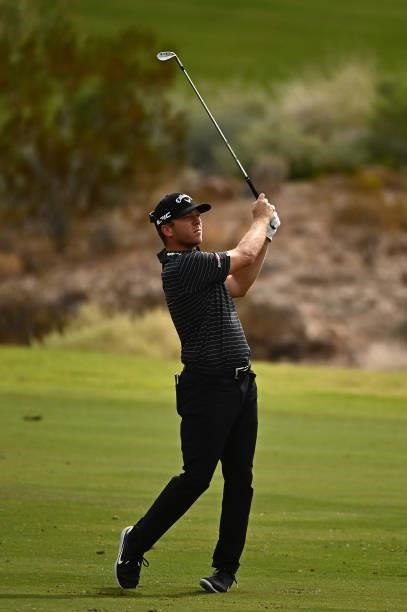 Talor Gooch hits from the fairway on the 18th hole during round one of the Shriners Children's Open at TPC Summerlin on October 07, 2021 in Las...