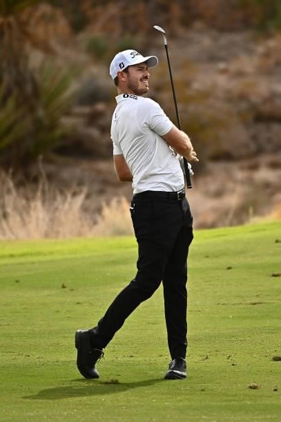 Bronson Burgoon hits his second shot on the 18th hole during round one of the Shriners Children's Open at TPC Summerlin on October 07, 2021 in Las...