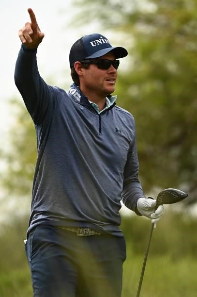 Adam Schenk signals on the ninth hole tee during round one of the Shriners Children's Open at TPC Summerlin on October 07, 2021 in Las Vegas, Nevada.