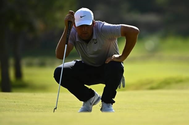 Scottie Scheffler lines up his putt on the 11th hole during round one of the Shriners Children's Open at TPC Summerlin on October 07, 2021 in Las...