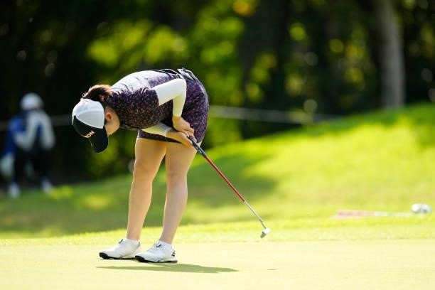 Kotoko Uchida of Japan reacts after a putt on the 2nd green during the second round of Kanehide Miyarabi Open at the Kanehide Kise Country Club on...