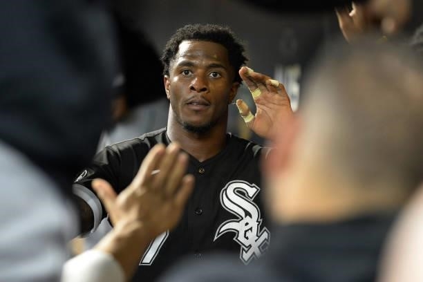 Tim Anderson of the Chicago White Sox celebrates with teammates after scoring against the Houston Astros during Game One of the American League...